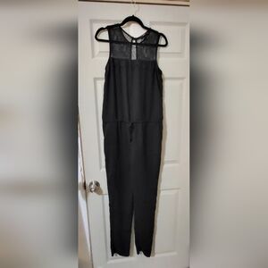 Forever 21 Jumpsuit with mesh lace detail ontop in Black size L